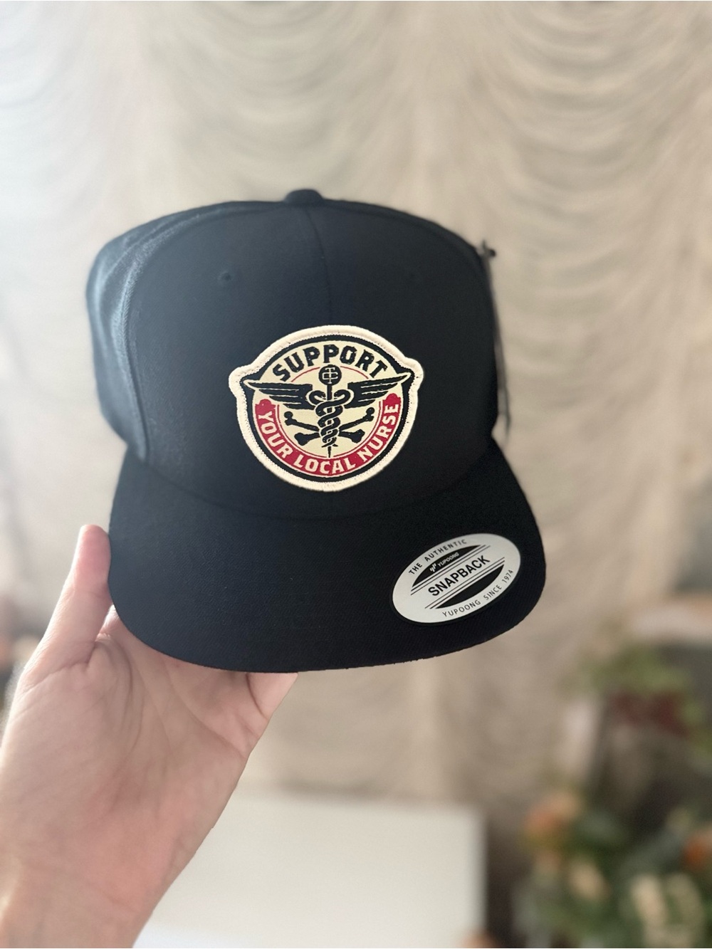 Trolls Black Snapback Hat with Red & Cream Support Patch